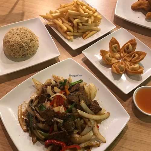 Mongolian Wonder, brown rice, Golden Wontons, french fries  at Loving Hut in Litchfield Park