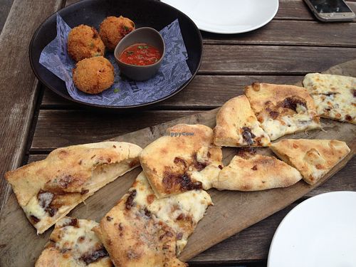Garlic bread with cheese, and arancini at Zizzi - Paddington Central in London