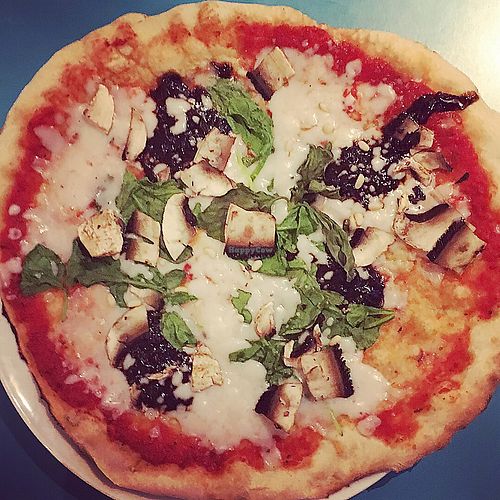 vegan classic margherita with balsamic caramelised onions, mushrooms, spinach and pine nuts at Zizzi in Nottingham