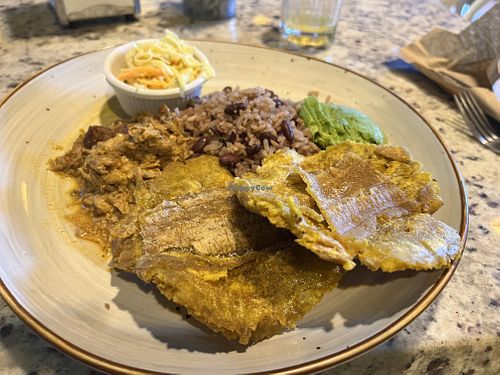 Beans and rice with shredded tofu skin and patacones    at La Esquina Vegana in Heredia