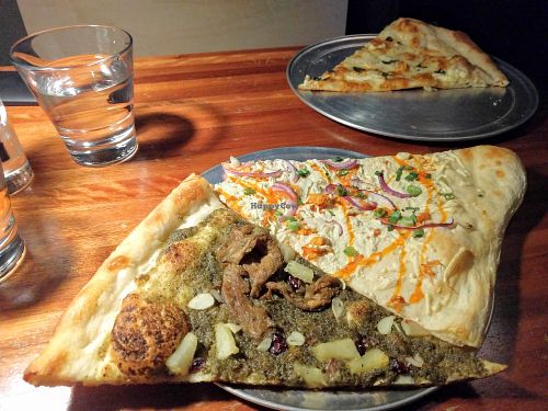 Vegan pizza by the slice at Sizzle Pie in Seattle