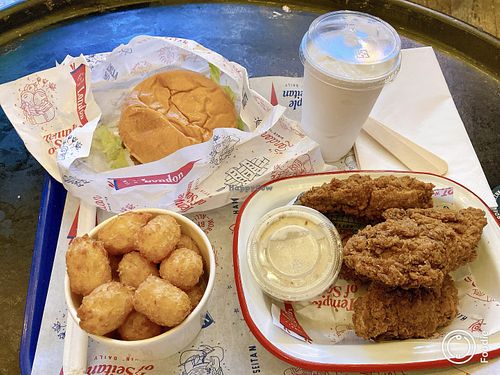 Vegan seitan burger and wings, tater tots, and vanilla milkshake  at Temple of Seitan - Hackney in East London