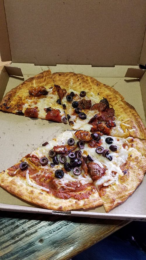 $11 whole pie with unlimited toppings at Oath Pizza in Boston