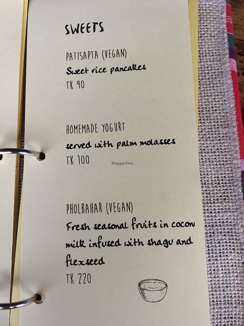 Two desserts are labelled vegan  at Jatra Biroti in Dhaka