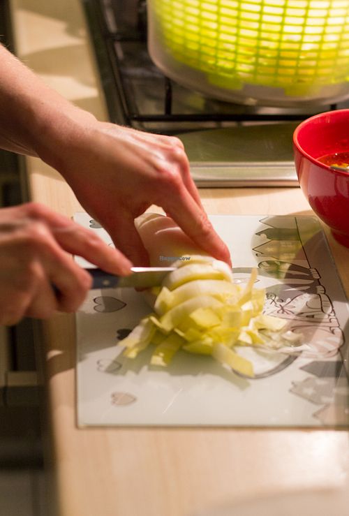 Caroline preparing food at Chez Caro et Seb in Saint-franc