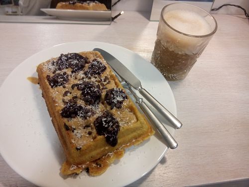 Glutenfree peanutbutter blueberryjam waffle and soymilklatte at Makers Kahvila in Helsinki