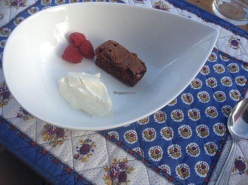 Chocolate olive oil cake with Creme fraiche and berries  at The Hidden Veggie Kitchen in Limoges