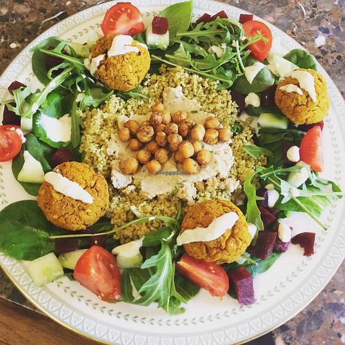 Delicious Middle Eastern Salad with Homemade Hummus, Roasted Chickpeas, Falafel and a Garlic Dill Dressing at The Hidden Veggie Kitchen in Limoges