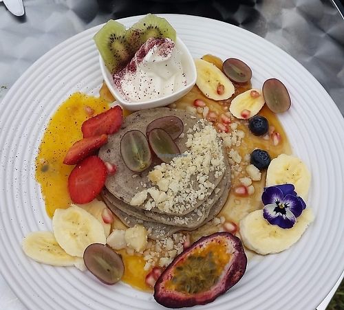 Buckwheat pancakes with Cocowhip and maple syrup and fruit.  at Mr Black Juicery in Berwick