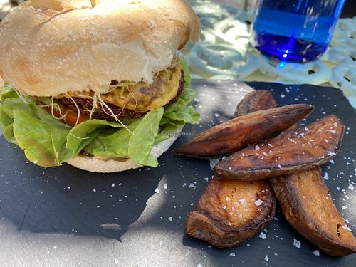 Veggie burger w/ vegan cheese   at Aubergine in Ibiza