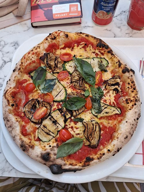 Zucchini eggplant pizza with vegan cheese at Puistola in Oulu