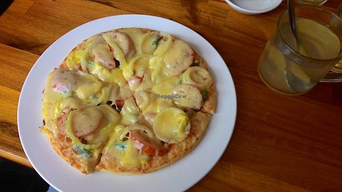Medium Veggie Pizza (Tomatos, onions, corn, olives, bell pepper, pineapple, cheese) at Rita's Pizza in Kon Tum