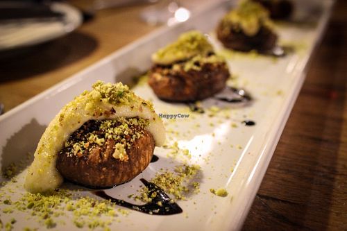 baked figs filled with almonds, cashew cream, pistachios and balsamic reduction at Incruenti in Prague