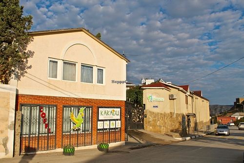 Near the cafe is an old fortress and hotel. at Kakadu Vegfood in Sudak
