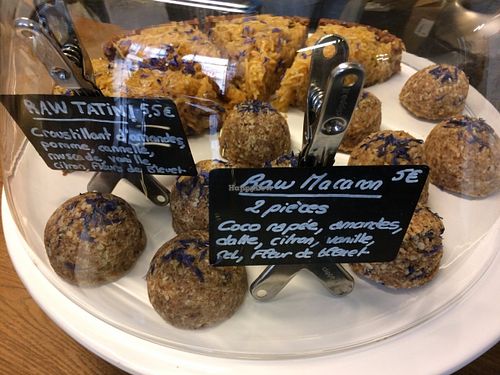 Items for sale on the counter, including yummy raw apple pie at the back at Wild & The Moon - Wild Lab Gravilliers in Paris
