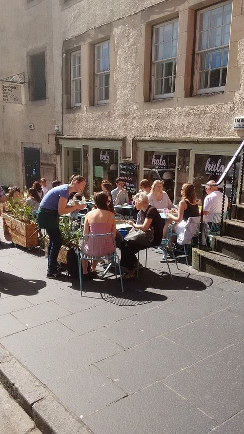 On a sunny day there is outdoor seating. at Hula Juice Cafe in Edinburgh