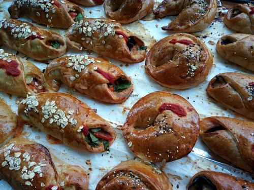 Pizza-Brioche from Vegi in Santa Eulalia, Ibiza. Filled with vegetables and vegan cheese. Some vegetarian options with goat cheese and/or mozzarella. This is NOT like empanadas. It's brioche bread with pizza flavour. Speciality you only find at Vegi. at Vegi in Ibiza