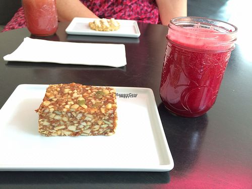 The Basic (beet, carrot, ginger) with nut bar at Verde Juice Bar in Winnipeg