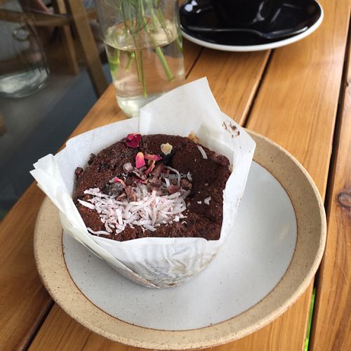chocolate and raspberry muffin  at Particle Cafe in Avondale Heights