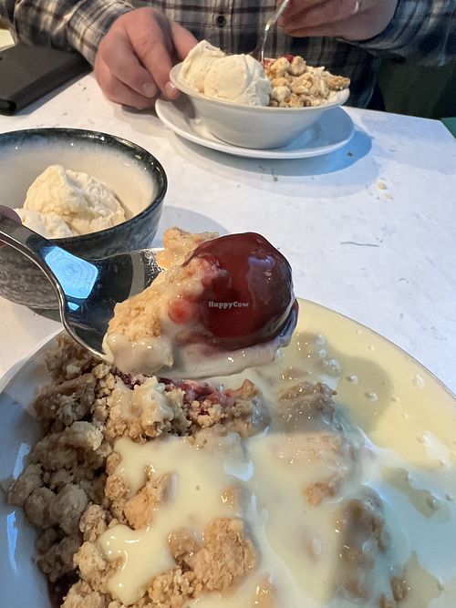 Cherry Crumble with custard and ice cream  at Stem & Glory in Cambridge