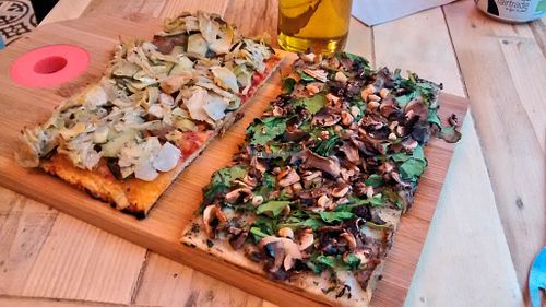 Truffle and antipasti pizzas at Hank Vegan Pizza in Paris