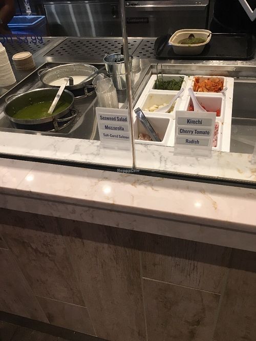 Sauces and finishing touches at Beefsteak in Bethesda