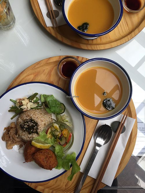 Vegan option on 8/6/2018 (falafel, brown rice, various little salads, soup). Aesthetically perfect! at Namban Oporto Kitchen Cafe in Porto
