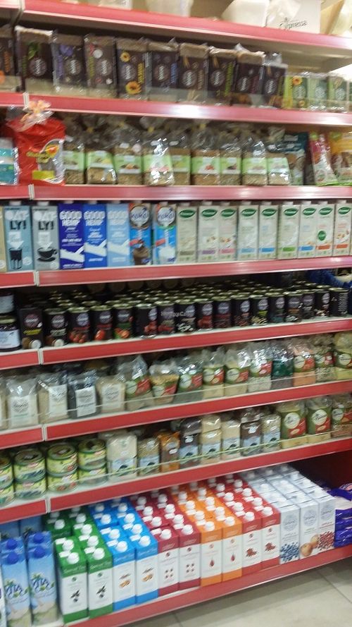 So many dairy-free milks! Tons of beans and legumes! at Fruit Garden in Hemel Hempstead