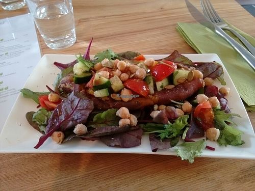 baked sweet potato with plenty of pulses and leaf at Simply Nood in Bridge Of Allan