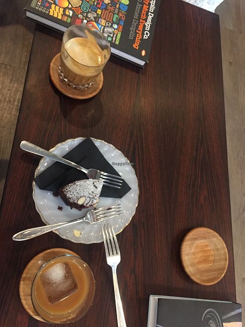 Latte, chocolate cake, and iced latte.  at Aubade Coffee in Vancouver