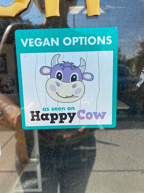 The happy cow sticker on the door! 💥  at Panda Chinese Restaurant in New Port Richey