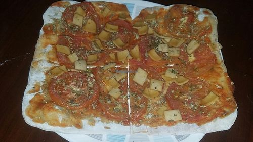 Vegan pizza at Sinergiarte in Bogota