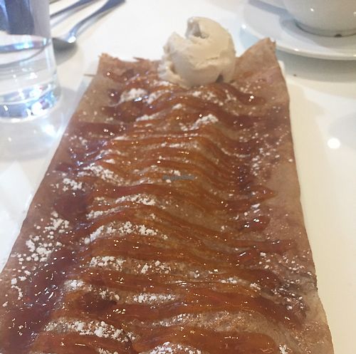 Apple and caramel crepe with vanilla ice cream. Enough for 2 to share! Delicious!  at Delice & Sarrasin in New York City