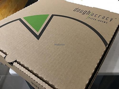 Pizza to go. Just like Grandma would want. at Doughocracy in Geneva