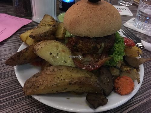 lentil burger with potato wedges at Mezzo  in Hannover
