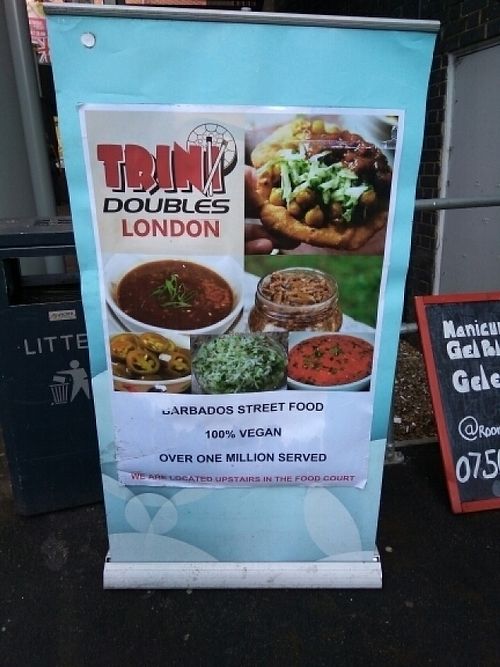 Sign at entrance at Trini Doubles in Watford