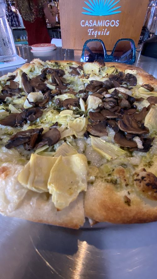Vegan pesto sauce with mushrooms and artichoke hearts! Yum! at High Pie Pizzeria in Telluride