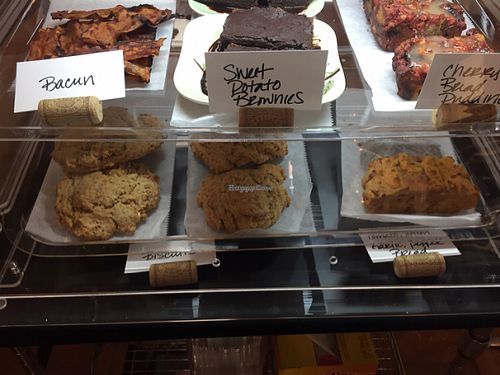 baked goods (rice paper bacun, sweet potato brownies, cherry bread pudding, biscuits, & tomato onion garlic bread)  at The Breakfast Club in Lawrence