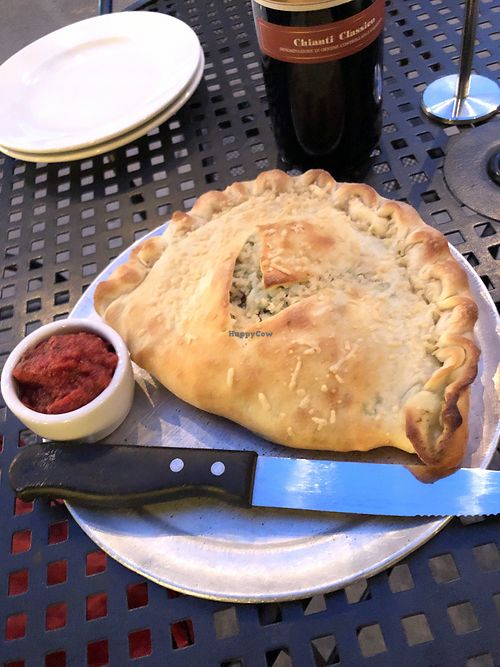 Pesto Popeye pizza turned calzone!   at Bend Pizza Kitchen in Bend