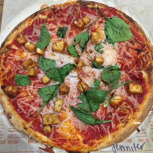 Vegan pizza w/ vegan cheese, vegan chick’n, & spinach  at Blaze Pizza in San Francisco