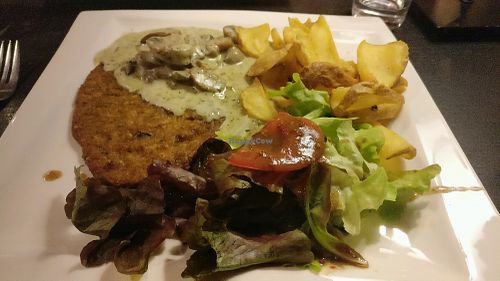 ";Escalope"; de riz sauce champignons et frites at Sherlock Holmes  in Quimper