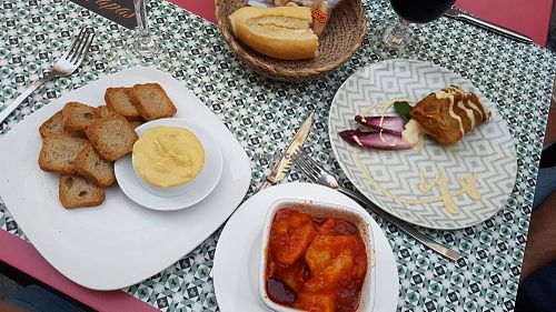 Hummus, curry puff and potato in tomato sauce at Toro Tapas in Ronda