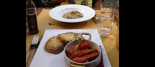 Mains- a risotto and a roasted vegetable dish at Cantine Bernardini in Lucca
