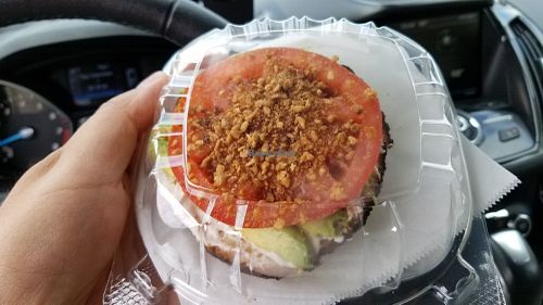 Your choice of bagel, tofutti cream cheese, avocado slices, tomato slice, and vegan bacon bits at Bagelmania & Coffee House in Huntington Beach