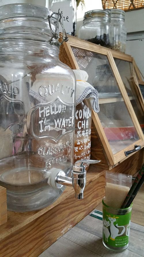 Water and kombucha jugs at Mise LMA in Tokyo