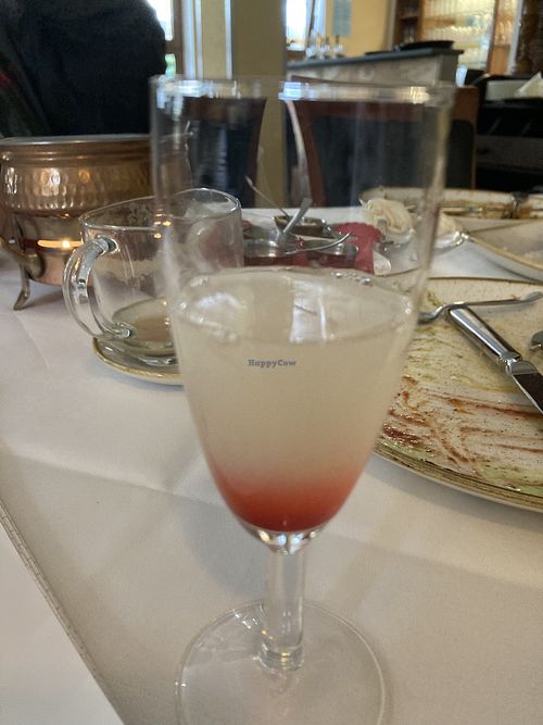 Fruit drink Serviër with bill (non-alcoholisch) although they serve vodkabase to thosewho drink alcohol   at Little India in Koenigstein