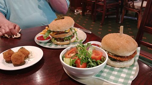 Two burgers and Mac and cheese balls. at The Green Lion Pub in Rozelle