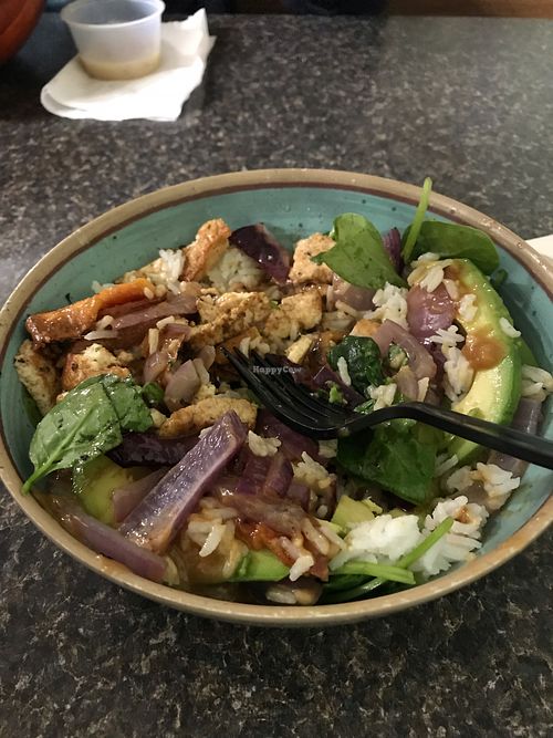 Delicious Buddha bowl with fresh made Thai peanut dressing  at Tossed on Market in Corning