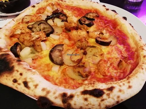 Smoked aubergine, pineapple, garlic & rosemary potatoes, maple siracha cauliflower at Pizza Punks in Glasgow