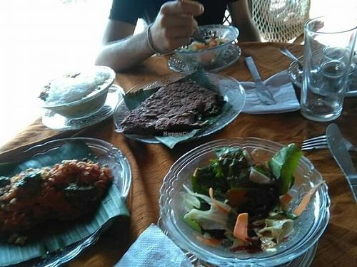 Raw salad, spinach and vegan cheese crepe, cannellonis and chickpeas and tofu curry at Dharma Swasti in Kuilapalayam